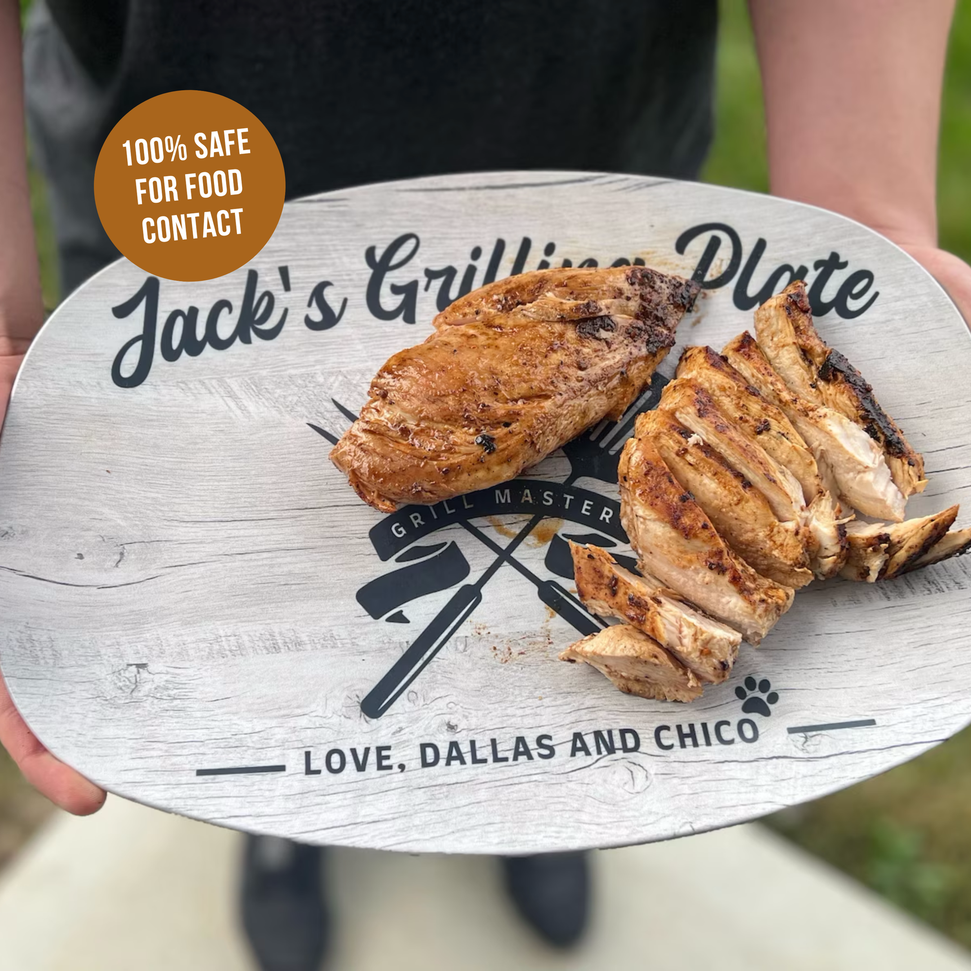 Grilled chicken on a 'Jack's Grilling Plate' with custom text.